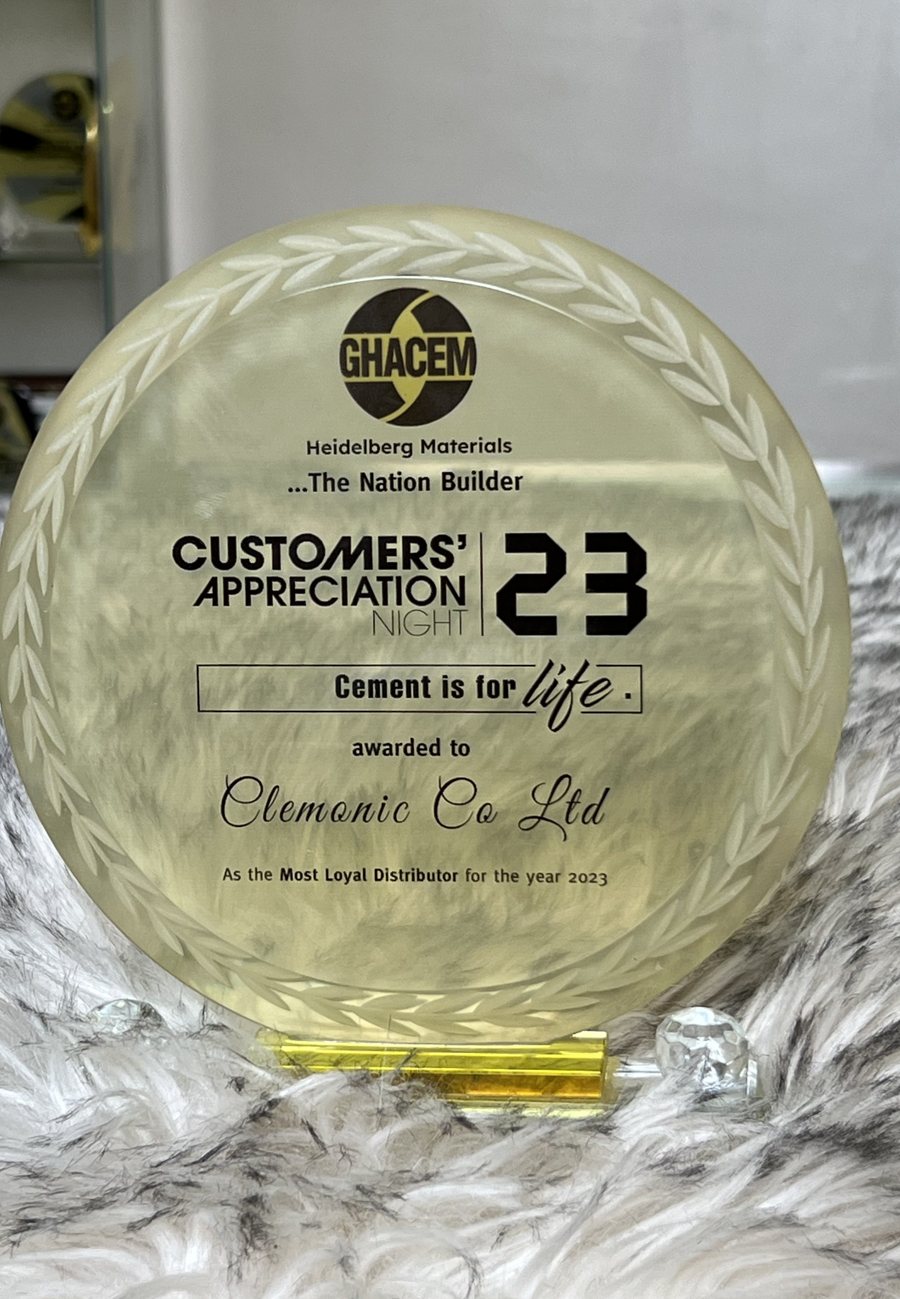 Engraved crystal plaque: GHACEM Customers' Appreciation Night 2023 — awarded to Clemonic Co. Ltd as the Most Loyal Distributor for the year 2023