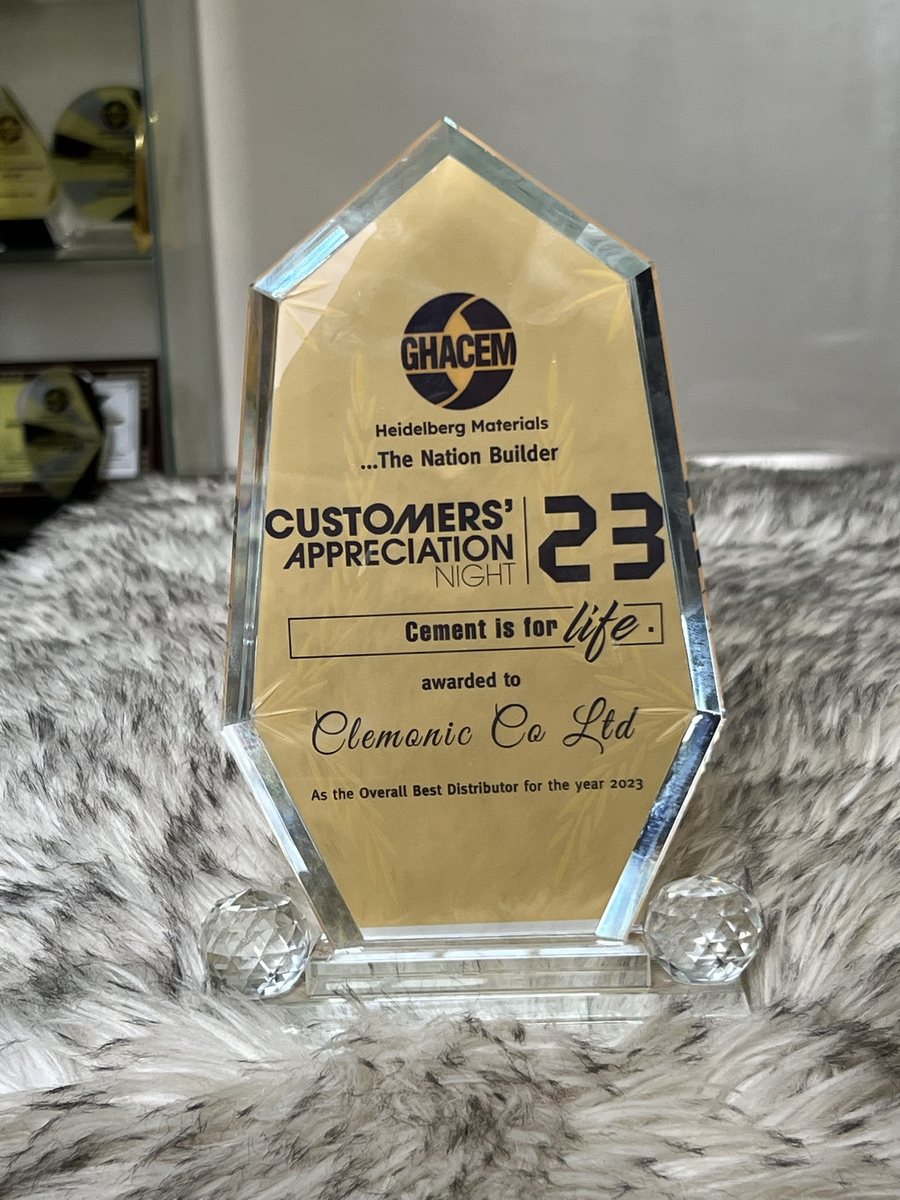 Gold-backed crystal plaque: GHACEM Customers' Appreciation Night 2023 — awarded to Clemonic Co Ltd as the Overall Best Distributor for the year 2023