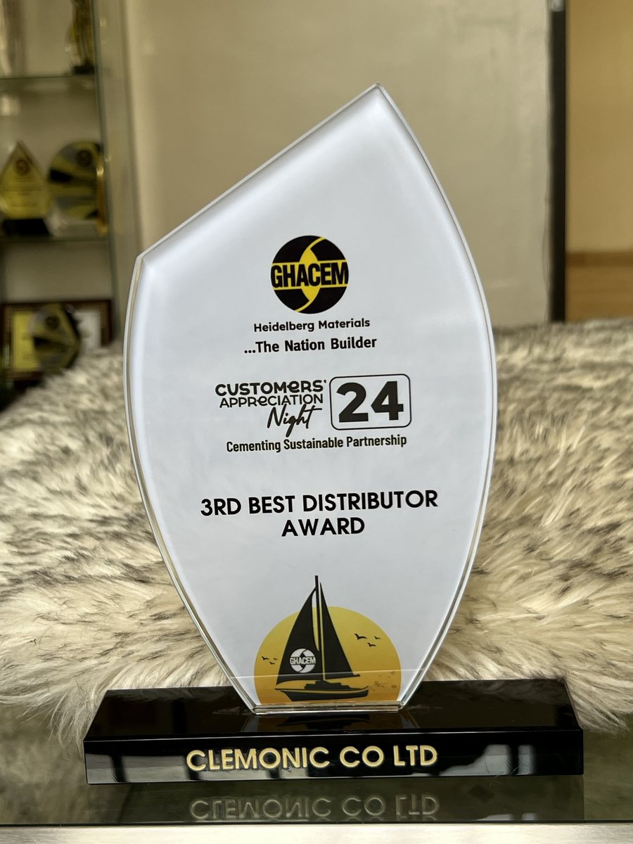 White leaf-shaped trophy on a black base engraved Clemonic Co Ltd: GHACEM Customers' Appreciation Night 2024 — 3rd Best Distributor Award